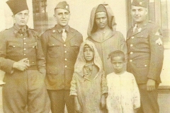 17th Engineer Heber L. McFall (far right) in Africa serving as a radio operator.