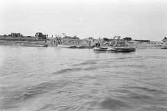 1Unloading treadway bridge sections from Brockway B666 6x6 bridge erector trucks, possibly belonging to 17th AEB