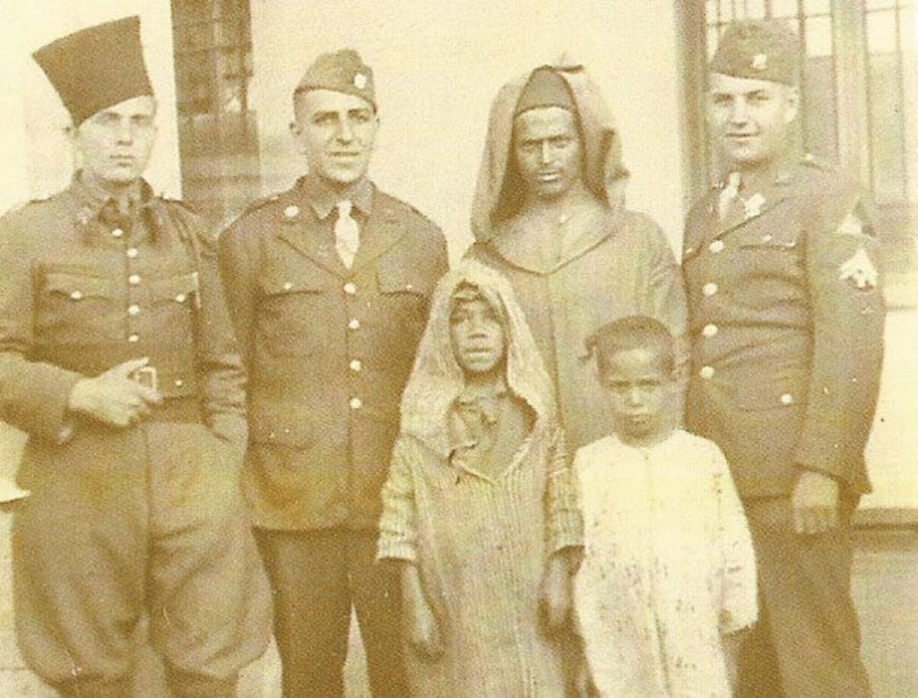 17th Engineer Heber L. McFall (far right) in Africa serving as a radio operator