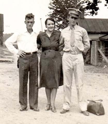 Ralph with his Mother Ruby and Stephfather Carl Wheeler. This picture was taken the day before he left for war. 