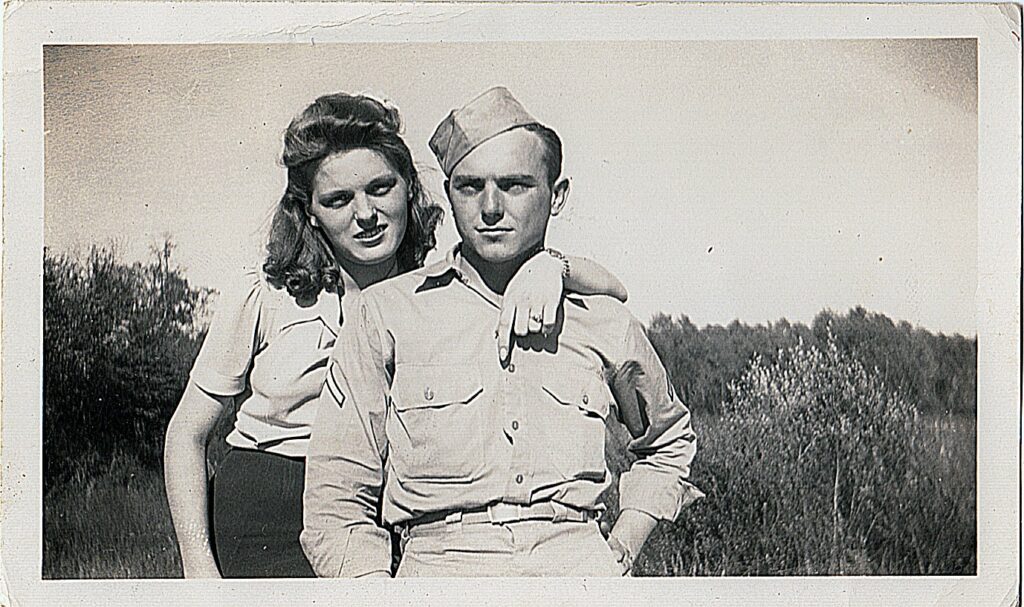 David Edd Hiett and Lucille Scharff, is showing off her engagement ring