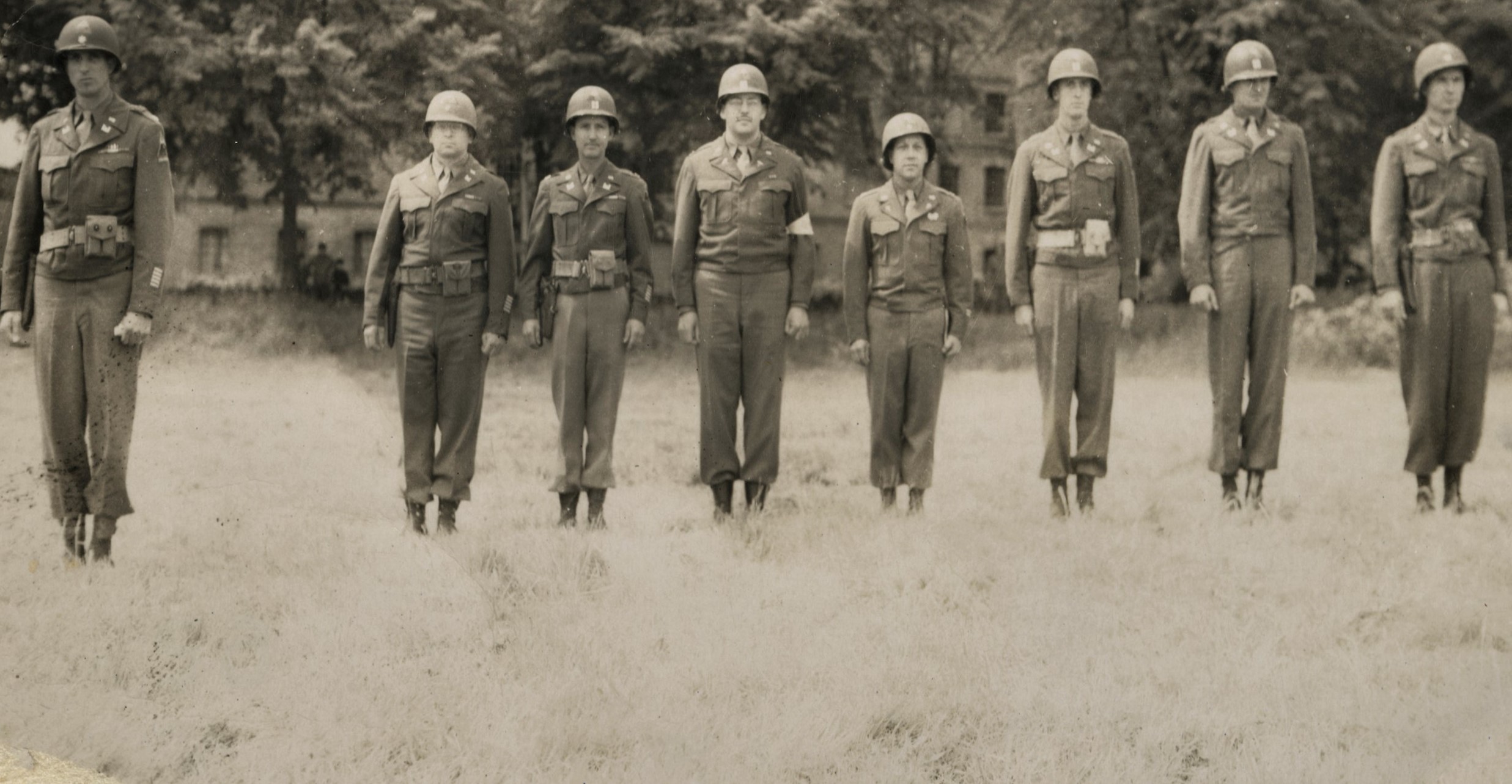 Captains of the 17th Armored Engineer Battalion staning at attention. One Captain is of the 48th Medical Battalion. Location and names unknown. (Courtesy and permission by Robert (Rob) Jolliff) 