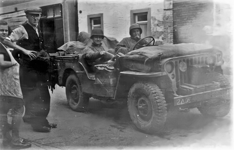 17th Engineer Jeep on tuesday afternoon on september 19,  1944. Taken at President Rooseveltstraat, Schinveld, Holland, with local civilians Joseph Zillen and Lies Joosten (source ww2inLimburg.com)